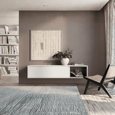 Mueble TV colgado TIVOLI minimalista con puerta abatible y cubo integrado en salón moderno