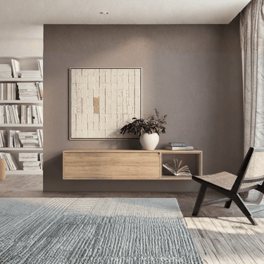 Mueble TV colgado TIVOLI minimalista con puerta y cubo integrado en salón moderno