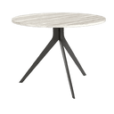 mesa de comedor redonda fija orta con patas metálicas en comedor moderno