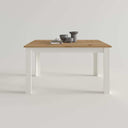 Mesa de comedor extensible ALLEGRA con pata en L y acabado en melamina de alta calidad.