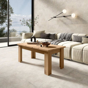 Mesa centro elevable ADRIANA con pata en L y espacio de almacenamiento interior.