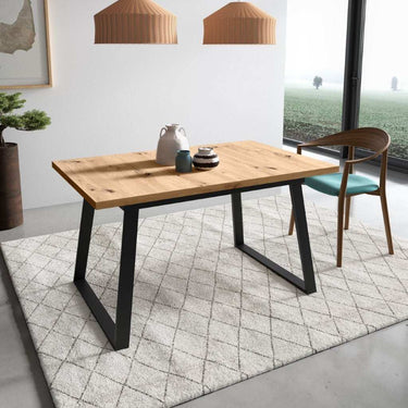 Mesa de comedor extensible ALESSANDRA con diseño moderno y estructura metálica robusta.