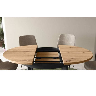 Mesa de comedor redonda extensible DONATA con patas metálicas en X y diseño moderno