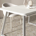 Mesa de comedor extensible AGNESE rectangular con patas trapecio y sistema semi-automático, fabricada en España.
