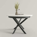 Mesa de comedor redonda extensible DONATA con patas metálicas en X y diseño moderno