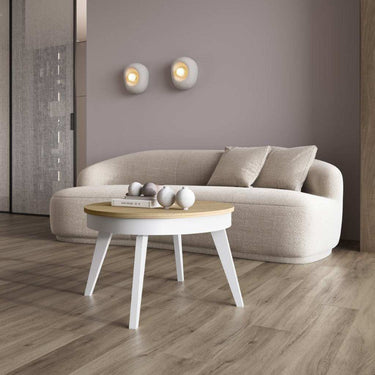 Mesa centro redonda elevable con patas inclinadas modelo CAELI en varios colores, fabricada en España