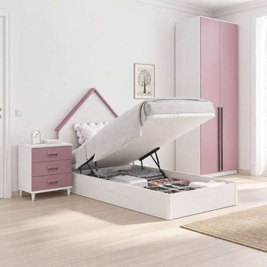 Cama juvenil abatible blanca con estructura de melamina, cabecero casita rosa y arcón de almacenaje integrado.