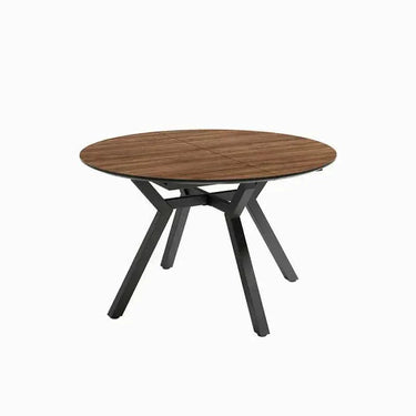 Mesa comedor redonda extensible modelo Giovanna con patas metálicas y sobre de madera en varios colores