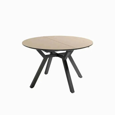 Mesa comedor redonda extensible modelo GIOVANNA con sistema semi automático y acabado en seis colores.