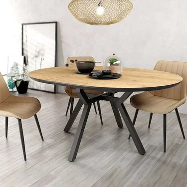 Mesa comedor redonda extensible modelo GIOVANNA con sistema de apertura semi automática y seis colores disponibles.