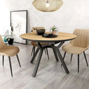 Mesa comedor redonda extensible modelo Giovanna con diseño moderno y apertura semi automática.