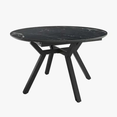 Mesa comedor redonda extensible con acabado efecto piedra y patas metálicas negras