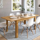 Mesa de comedor extensible Allegra con pata en L y acabado en melamina de alta calidad.