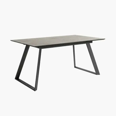 Mesa comedor extensible Romina piedra con acabado efecto piedra y patas metálicas negras