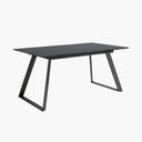 Mesa comedor extensible ROMINA PIEDRA con acabado efecto piedra y patas metálicas negras.