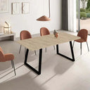 Mesa extensible rectangular ALESSANDRA con diseño moderno y patas trapecio.