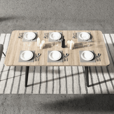 Mesa de comedor extensible LUNA con patas metálicas en X y acabados en varios colores.
