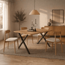 Mesa comedor fija GIA con patas metálicas en X y diseño contemporáneo