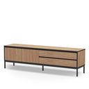 Mueble TV in warm oak-effect melamine with black metal frame and legs, featuring two doors and two drawers.