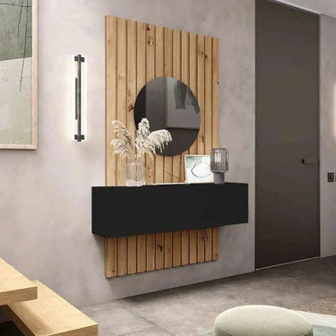 Recibidor with a black wall-mounted cabinet, round mirror and natural wood slatted panel in a clean modern design.