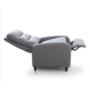 Sillón Relax gris tapizado en tejido suave, reclinado con respaldo acolchado y reposapiés extensible; patas negras.