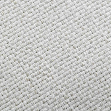 Sillón de jardín Abura con cojines beige en terraza moderna