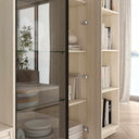 Vitrina asimétrica salón TIVOLI con cristal Olas y perfil aluminio negro