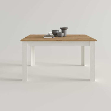 Mesa de comedor extensible ALLEGRA con pata en L y acabado en melamina de alta calidad.