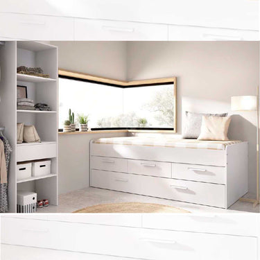 Cama Compacta juvenil blanca con estructura de melamina, tres cajones con tiradores y colchón con funda clara.