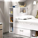 Cama Compacta juvenil en blanco con estantería lateral, cajón inferior y arcón para almacenamiento integrado y diseño reversible.