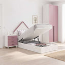 Cama juvenil abatible blanca con estructura de melamina, cabecero casita rosa y arcón de almacenaje integrado.