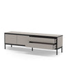 Mueble TV in light grey matte finish, with flat-front doors, open shelving, and slender black metal legs.
