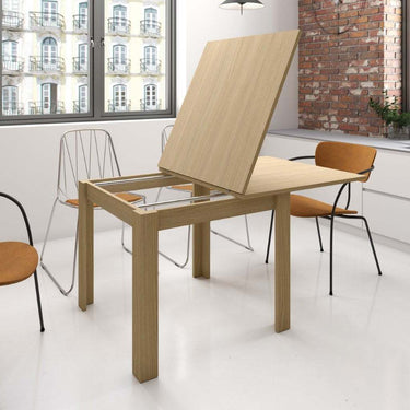 Mesa cuadrada tipo libro extensible Alessia con patas en L y tablero laminado natural