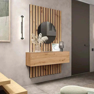Recibidor de madera en tono roble claro, con panel trasero de listones verticales, cajón frontal y espejo redondo.