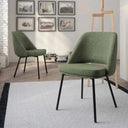 Silla de comedor verde tapizada en tela texturizada, con asiento acolchado, respaldo curvo y patas metálicas negras.