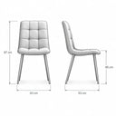 Silla de comedor gris claro tapizada en microfibra, con respaldo capitoné de cuadrantes y patas metálicas negras.